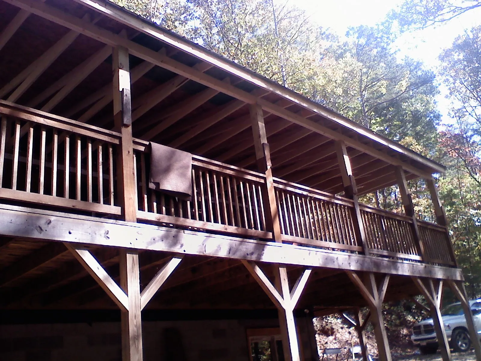 Timber framing under a new elevated porch and deck — Roof Leak Repair in Borup by Roofing Brothers